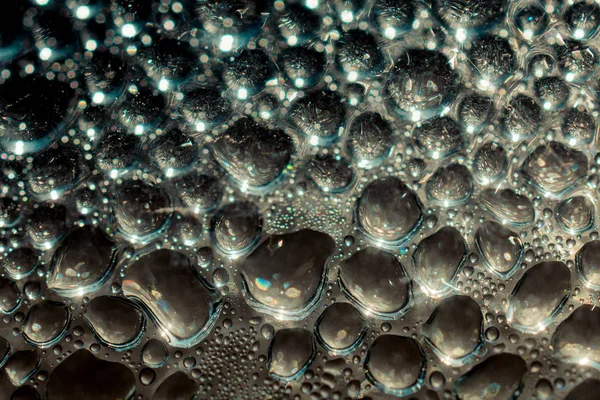 Fundo coberto com l gotas de água em close-up — Fotografia de Stock