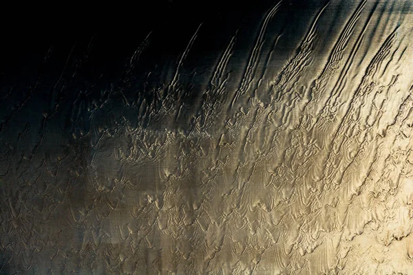 Metal yüzeydeki su akışı soyut doku arkaplanı 