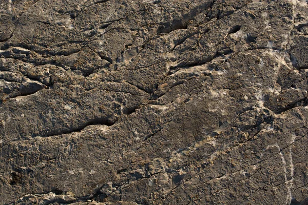 Fels- oder Steinoberfläche als Hintergrundstruktur — Stockfoto