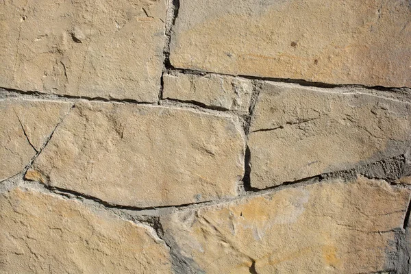 Wall made of the same type of stones — Stock Photo, Image