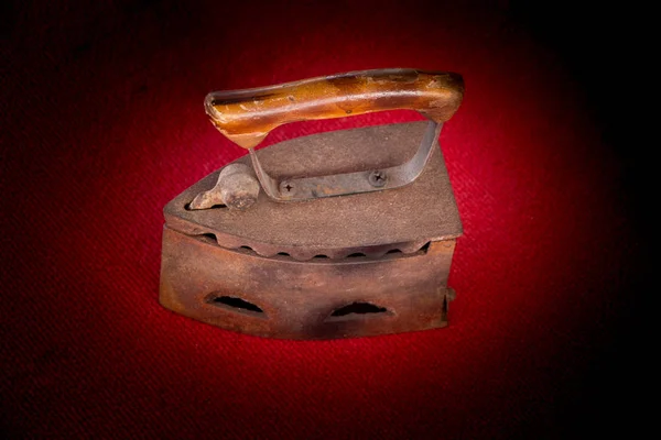 Retro style heavy antique iron tool for ironing — Stock Photo, Image
