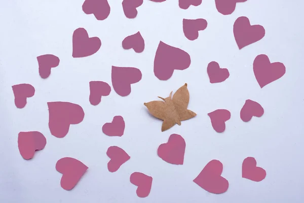 Paper butterfly and paper hearts