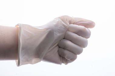 Koruyucu steril lateks eldiven. Elindeki eldiven. Coronavirus COVID-19 salgın konsepti