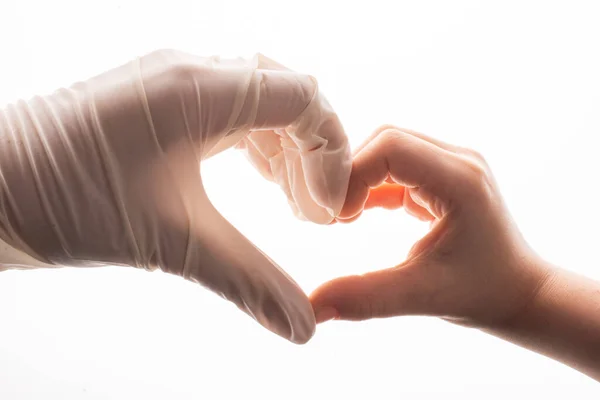 Koruyucu steril eldiven. Elindeki eldiven. Coronavirus COVID-19 salgın konsepti