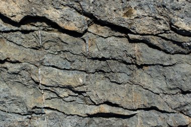 Arka plan dokusu olarak doğal kaya veya taş yüzeyi