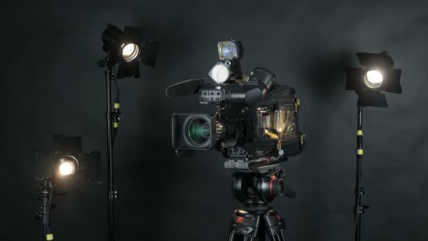Professional broadcast camera at unrecognizable tv news studio. Isolated on background. — Stock Video