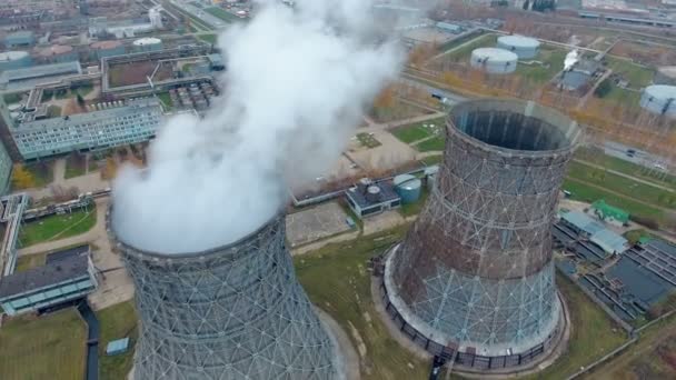 Aerial view of power plants, thermal power station. Smoking pipe at industrial area. — Stock Video