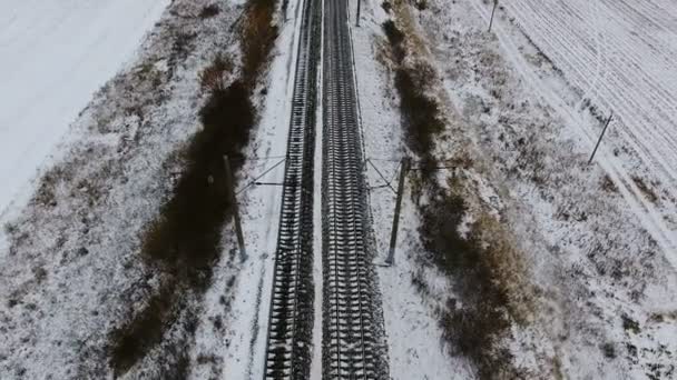Railway, railroad in winter. Aerial. No trains. — Stock Video