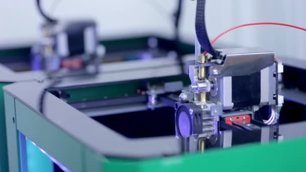 3D printers working printing plastic model with Plastic Wire Filament. — Stock Video