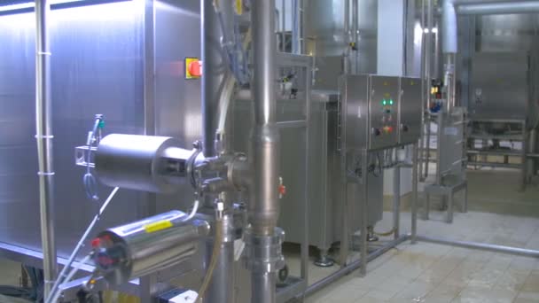 Water purification laboratory. Chemist checking water purification equipment. — Stock Video