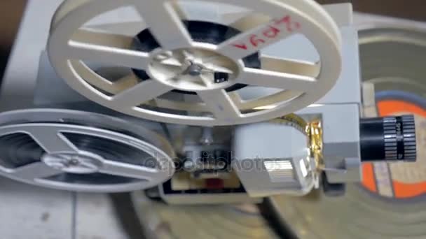 Vintage, old film projector with turning reels. — Stock Video