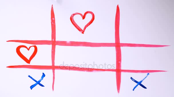 Conceito de relação romântica. Homem e mulher jogam Tik-Tak-Toe. O amor vence . — Vídeo de Stock