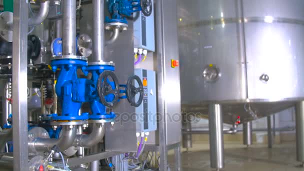 Modern technological industrial equipment. Pipelines, pumps, filters, gauges, sensors, motors. tank at chemical industrial factory. — Stock Video