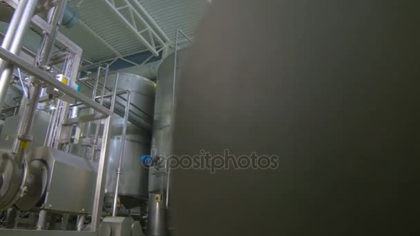 Modern technological industrial equipment. Pipelines, pumps, filters, gauges, sensors, motors. tank at chemical industrial factory. — Stock Video