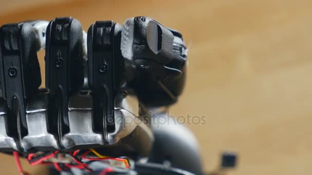 Bionic arm. Innovative robotic hand made on 3D printer. Futuristic technology. Timelapse. — Stock Video