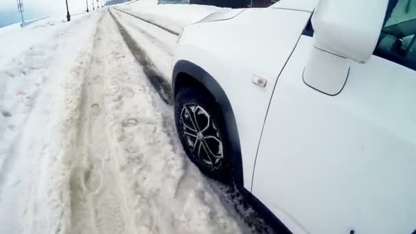 Tires, wheels driving through heavy snow. Slow motion. On board camera. — Stock Video