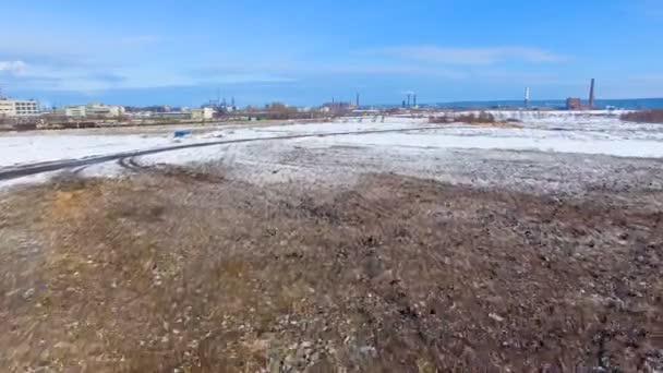 Garbage dump, landfill site with flock of scavenging birds - crows, ravens. Epic aerial shot. — Stock Video