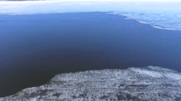 4K. Ice floating on the river in spring time. Aerial view. — Stock Video