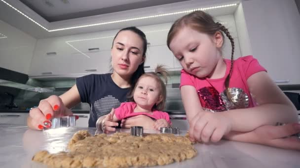 The close-up of the cookies making process. Family portrait. Slowmotion. HD. — Stock Video