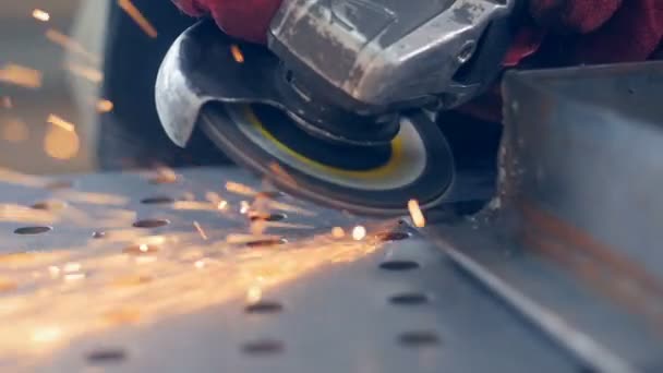 Grinding machine being used to process metal. Slow motion. — Stock Video