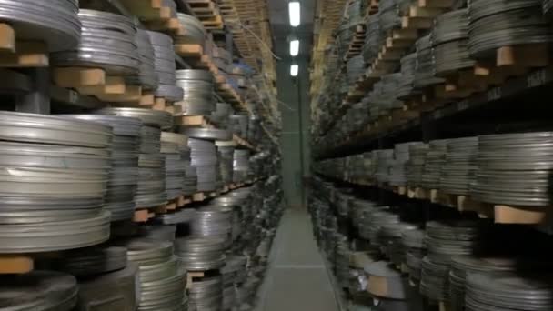 Thousands of film reels being stored in film archive. — Stock Video