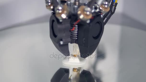 A detailed view on a working FDM printer nozzle. — Stock Video