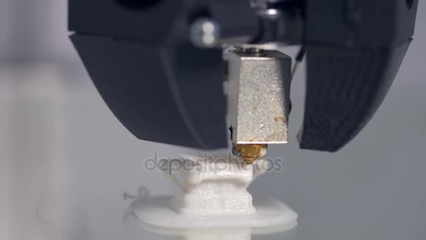 A macro view on a working 3d printer nozzle. — Stock Video