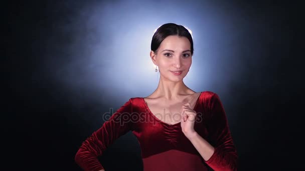 A ballerina leaves the stage with a smile. Ballerina portrait 4K. — Stock Video