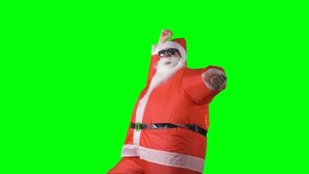 Babbo Natale fa divertenti imitazioni di danza e equitazione . — Video Stock