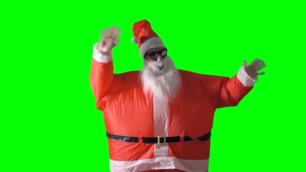 Santa Claus golven aan de camera met beide handen. — Stockvideo