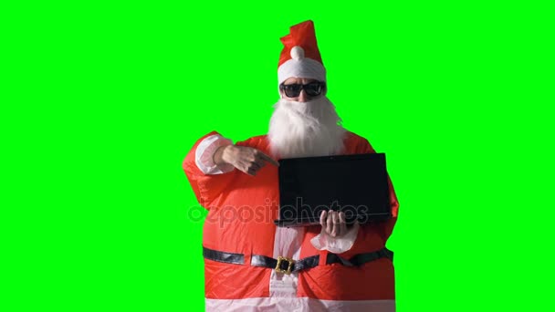 Santa Claus wants you to buy a laptop. — Stock Video