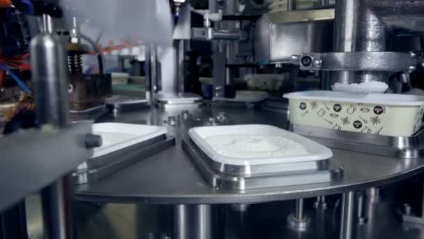 Automated production line of milk products at cheese plant. — Stock Video