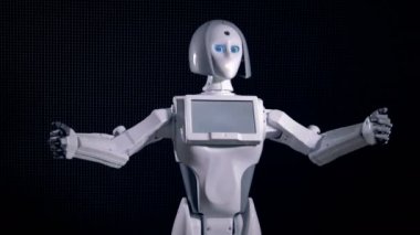 Beyaz bir robot el hareketi ve konuşuyor hızlı bir hareket.