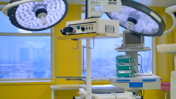 Close up of medical equipment and operating lamps in a hospital surgery. — Stock Video