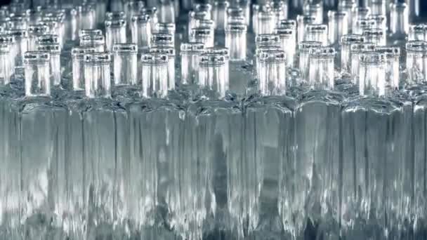 Translucent opened bottles moving forward and sideways. Timelapse. — Stock Video