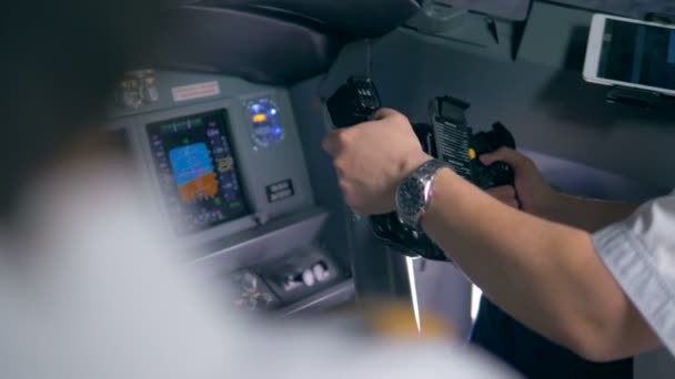 A pilot turns the steering wheel, close up. — Stock Video