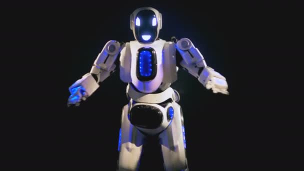 Λευκό android φαίνεται στην κάμερα και χορούς. 4k. — Αρχείο Βίντεο
