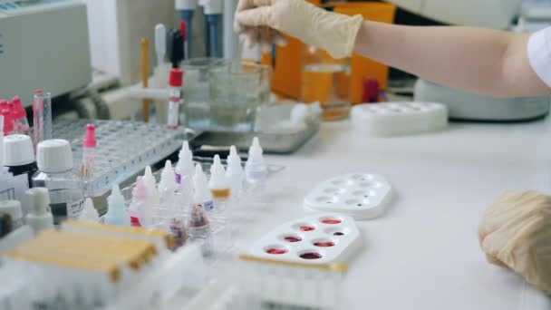 Chemicals are being diluted with water in the laboratory — Stock video