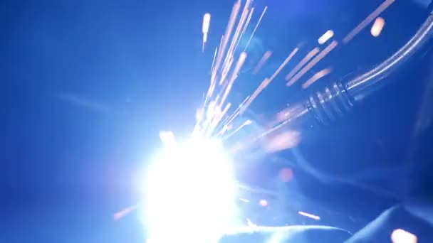 A welding process at a plant. Welding sparks, slow motion. — Stock video