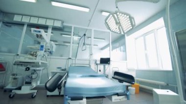 Hospital bed in an empty labour ward
