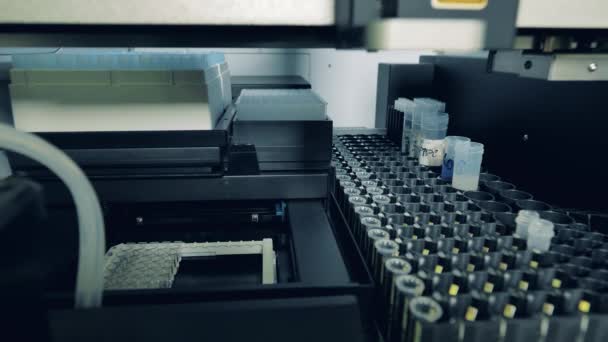 Laboratory coronavirus 2019-nCoV analyzing mechanism is testing probes with samples — Stock Video