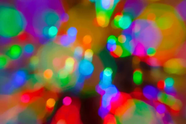 Şehir planının yaratıcı Bokeh festivali gece lambası. Bulanık gece arkaplanındaki renkli odaklanmış bokeh ışıkları.