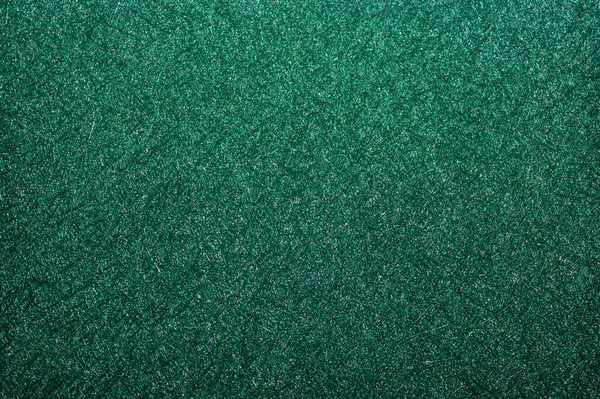 Güzel, parlak zümrüt bir yüzey ve güzel bir desen. Eski bir kitabın kapağı.