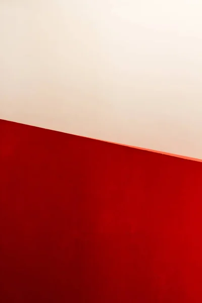 red and white wall abstract background combination of colors and light line