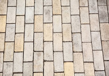 Bej rengi açık dikdörtgen sokak fayans dokusu. Yatay oryantasyon. Yüksek kalite fotoğraf.