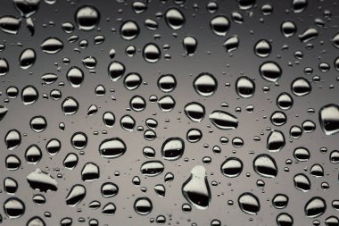 Cam, arka plan yağmur damlaları. su açılan arka plan textu