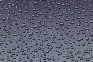 Cam, arka plan yağmur damlaları. su açılan arka plan textu