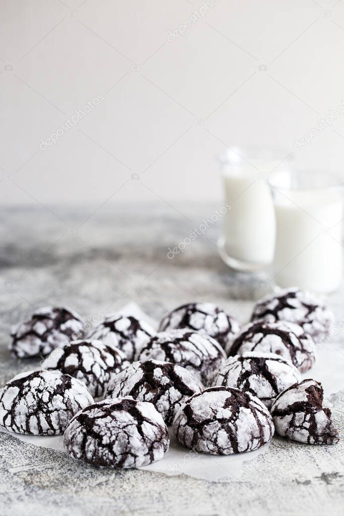 chocolate cookies. homemade chocolate crinkles cookies powdered sugar with milk.