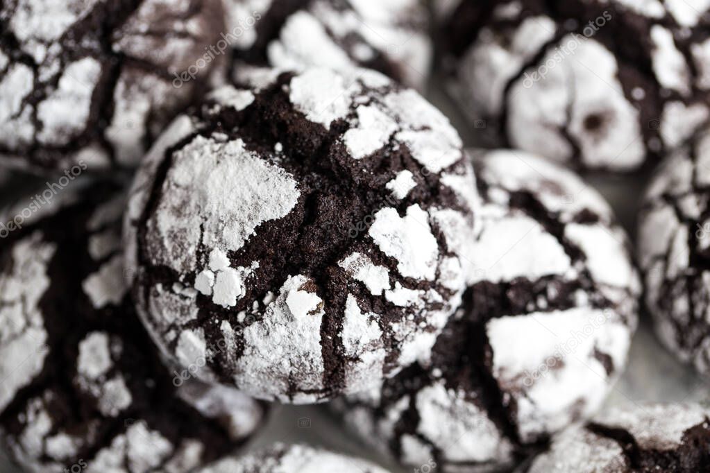 chocolate cookies. homemade chocolate crinkles cookies powdered sugar.
