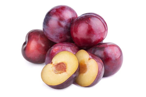 Group of plum fruits and a half  on white background — Stock Photo, Image